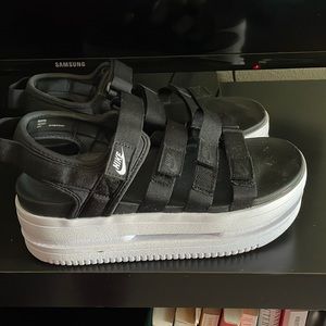 Nike platform sandals size 9. I wore them once.